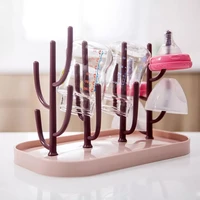 baby feeding bottle drying drain rack nipple pacifier cleaning holder dryer drainer storage creative tree branch foldable cup