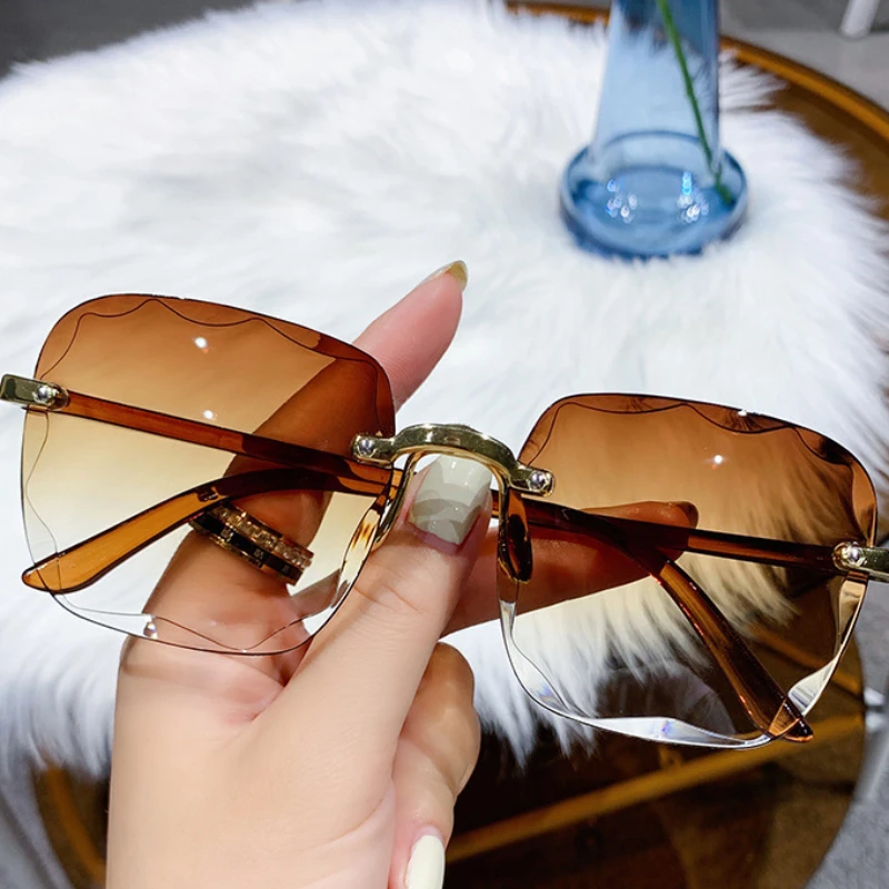 Модные солнцезащитные очки без оправы с обрезанными краями Новинка летние