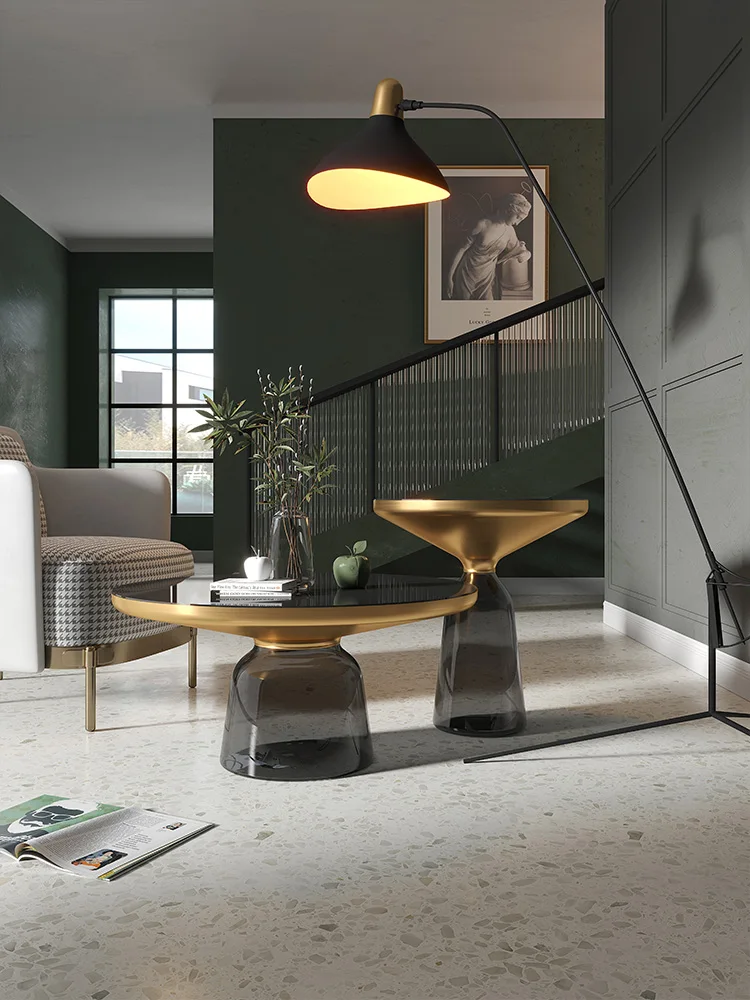 

Modern light luxury tea table simple style glass small round table net red living room furniture designer