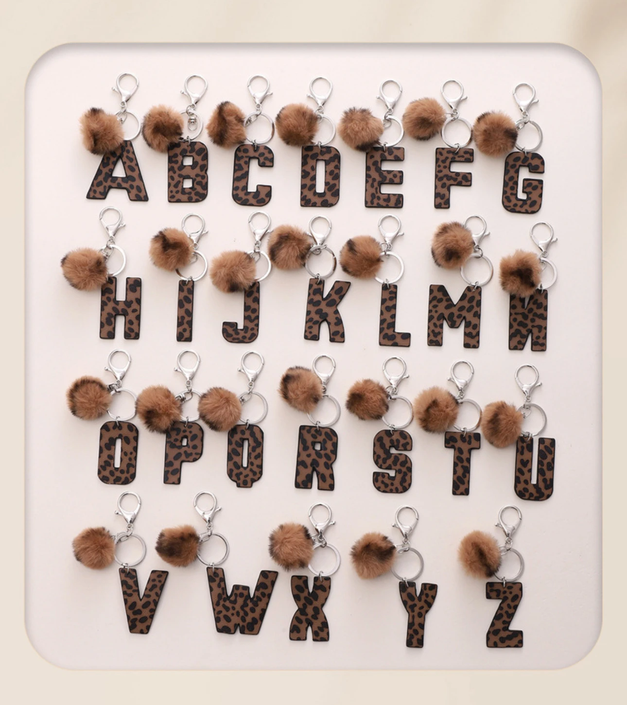 Кожаный брелок с леопардовым принтом