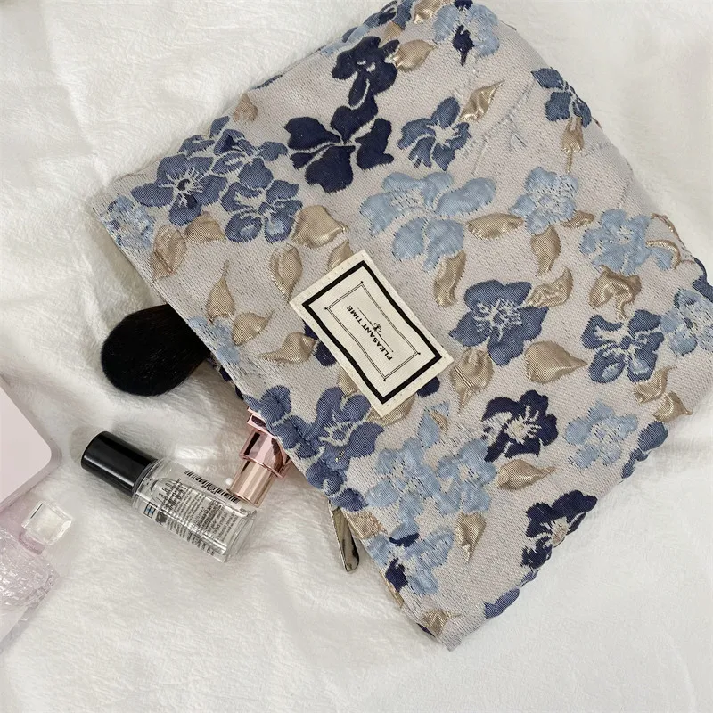 

Relief Flowers Print Women's Cosmetic Bags Ins Lipstick Storage Bags Relief Clutch Bags Crumpled Camellia Texture Cosmetic Bag