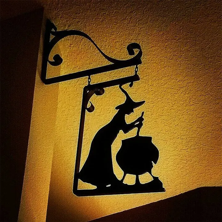 

Metal wall art witch logo Leaky Cauldron metal sign