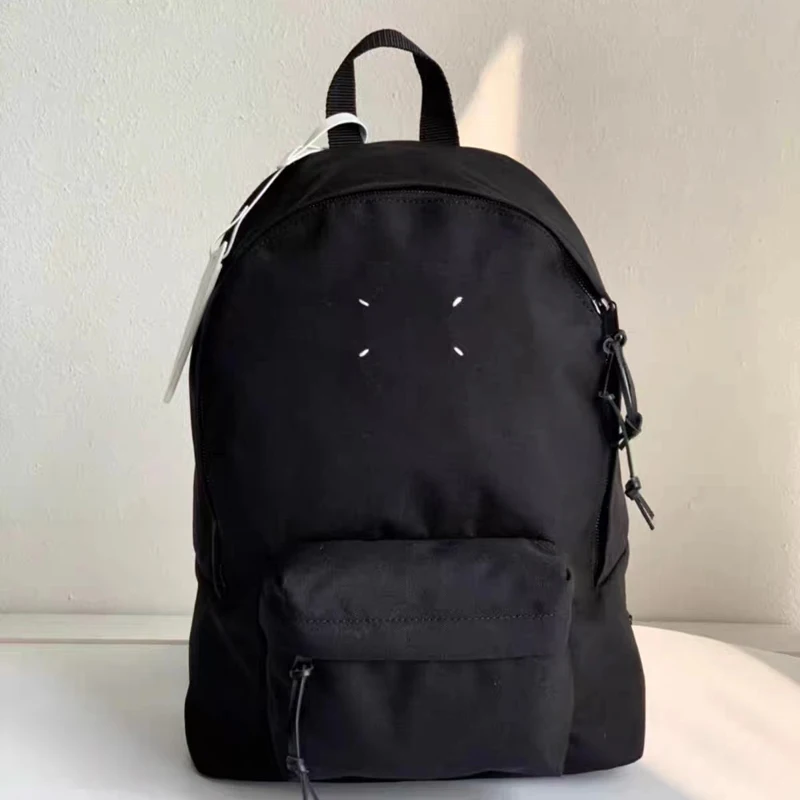 

Extra-large capacity MM6 Magira Backpack Men's and women's personality High quality leisure travel computer bag tag