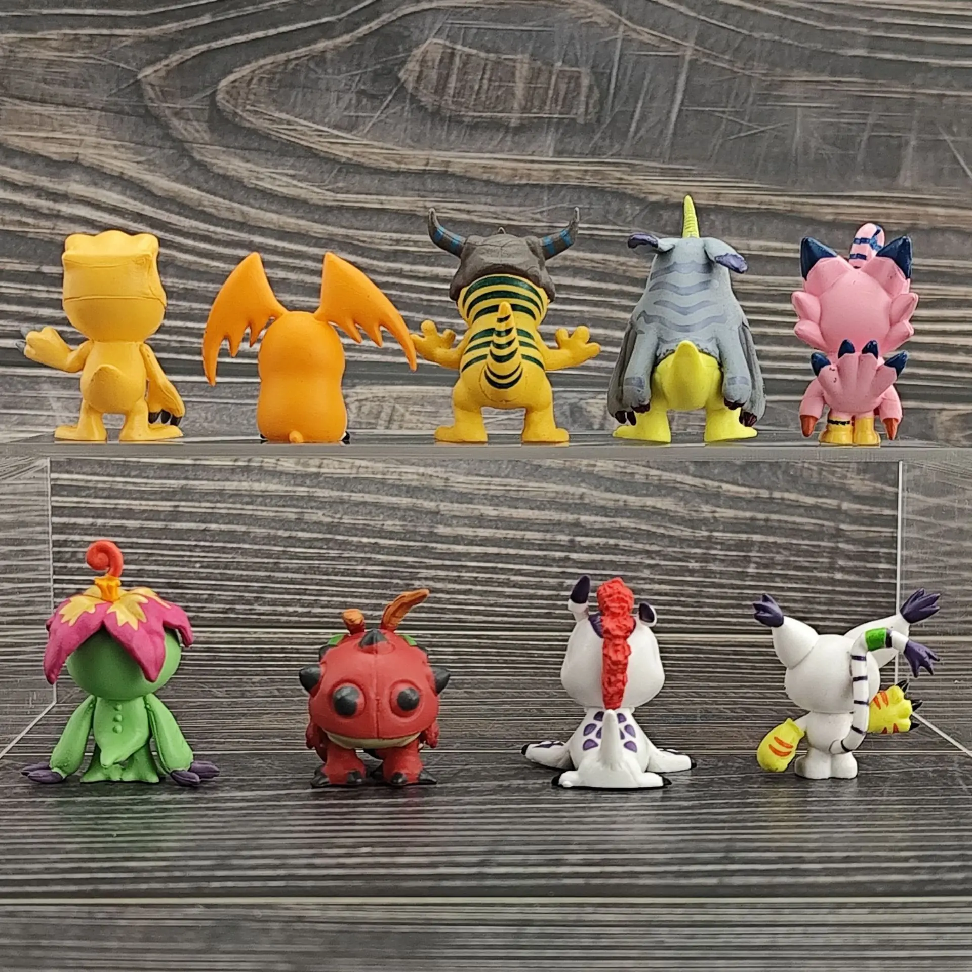 Фото Мини-фигурка Digimon Adventure 4 см: Агумон, Патамон, Греймон, Габумон, Баймон, Палмон, Тентомон, Гомамон, Гатомон. Модель из ПВХ для рабочего стола. №2