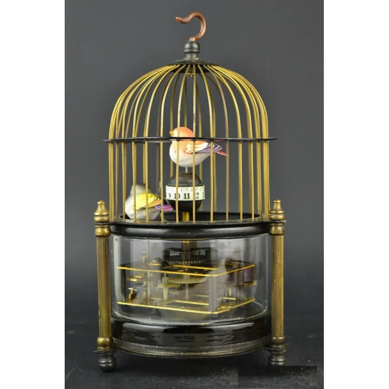 

Rare brass bird cage Mechanical Table Clock Alarm Clock