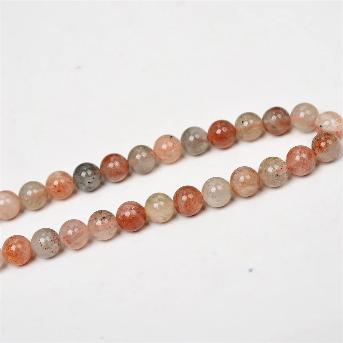 Натуральные граненые круглые бусины Arusha с золотой точкой из солнечного камня