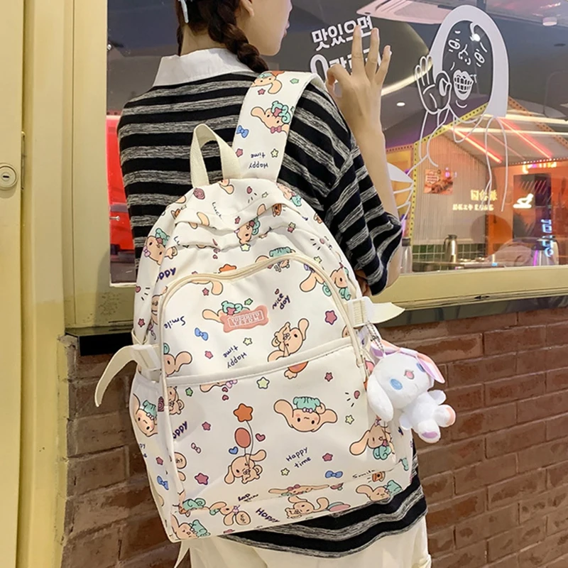 

Рюкзак Kawaii из серии аниме Sanrio, милый рюкзак Kuromi Cinnamoroll с принтом, вместительная школьная сумка для учеников с мультяшным плюшевым кулоном