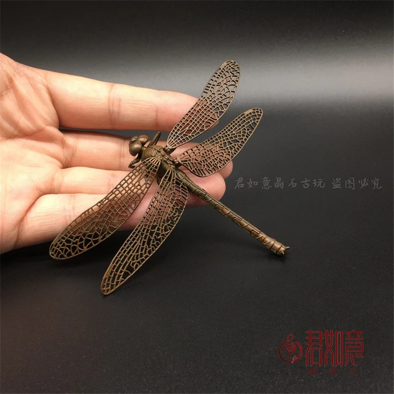 

Delicate and lovely (dragonfly) make old bronze figurines imitating antique