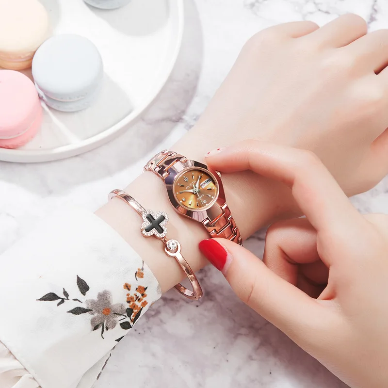 Women's watch new girls' watch fashion quartz watch steel belt double calendar women's watch a piece of hair