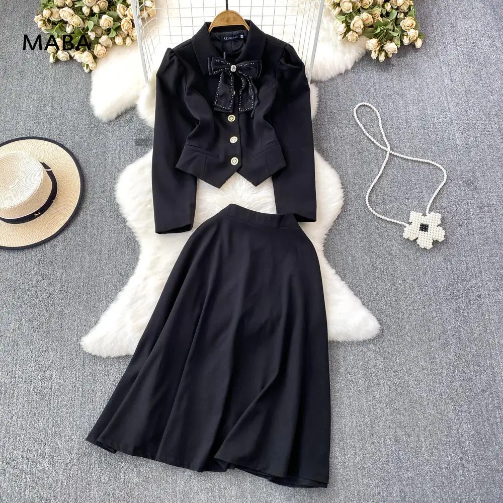 

Женский комплект из двух предметов, маленькая черная юбка с бантом и пышными рукавами + длинная юбка-трапеция, Осень-зима