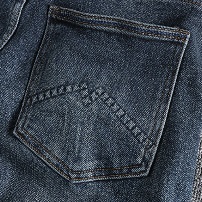 Retro washing blue hole patch jeans men's slim little straight feet trend Europe and America Joker youth long pants