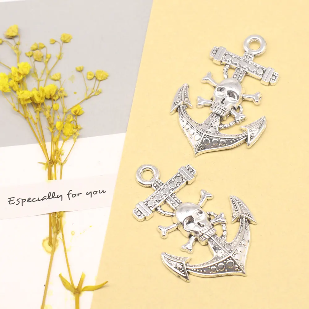 

2 шт., подвески в виде черепа, якоря, 55 х37 мм