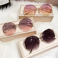 fashion irregular round sunglasses for women ocean water cut trimmed lens rimless metal curved temples sun glasses uv400