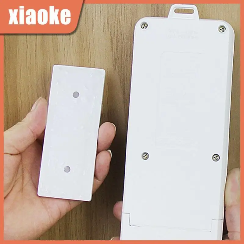 

2/4/6PCS Wall-mounted Holder Self-adhesive Punch-free Plug Fixer Plastic Socket Storage Holder Wire Organizer Racks