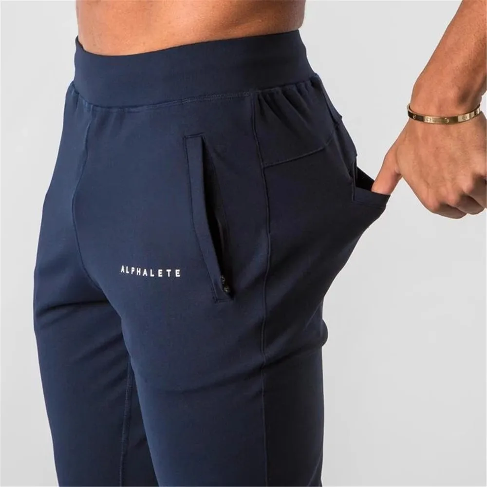 

Style Mens ALPHALETE Brand Jogger Sweatpants Man Gyms Workout Fitness Cotton Trousers Male Casual Fashion Skinny Track Pants