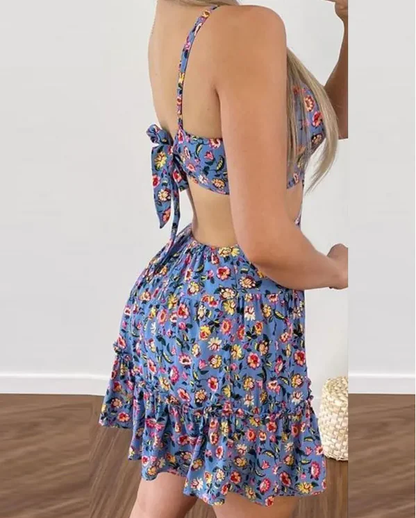 

Женское винтажное платье с цветочным принтом, оборками на Подоле и глубоким V-образным вырезом