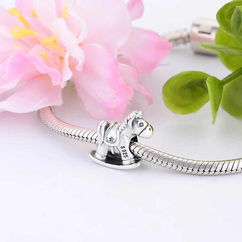 Браслет-качалка в виде лошади-качалки из серебра 100% пробы