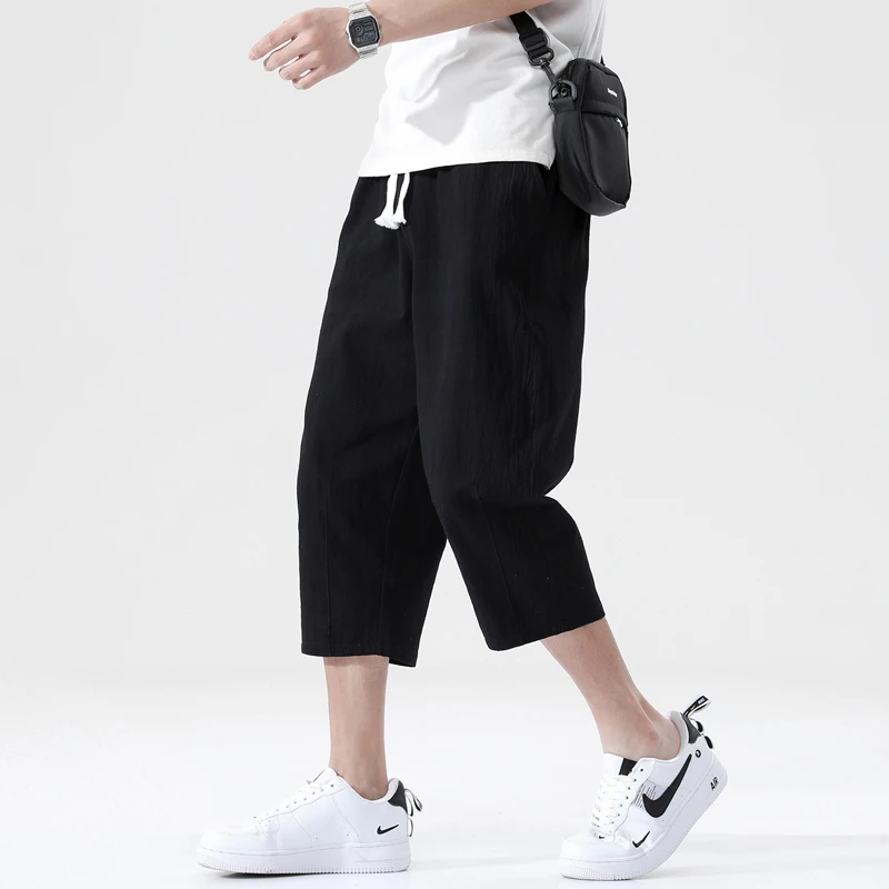 

Summer casual men's all-match cotton and linen loose linen pants Korean fashion trend nine-point pants men's plus size