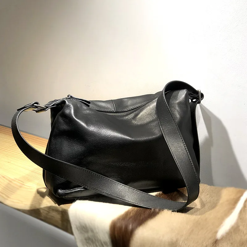 Vintage fashion genuine leather men and women universal wide shoulder strap black messenger bag casual outdoor shoulder bag