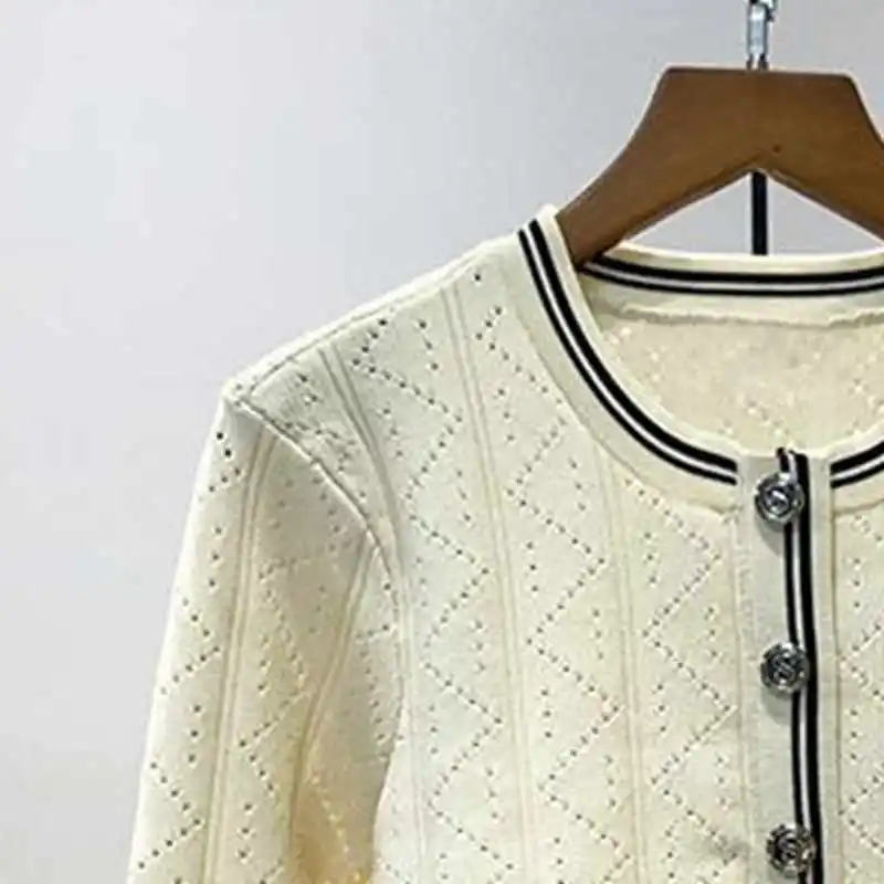 

2023 Early Autumn New Women Round Neck Long-sleeved Knitted Cardigan Skirt Two-piece Set