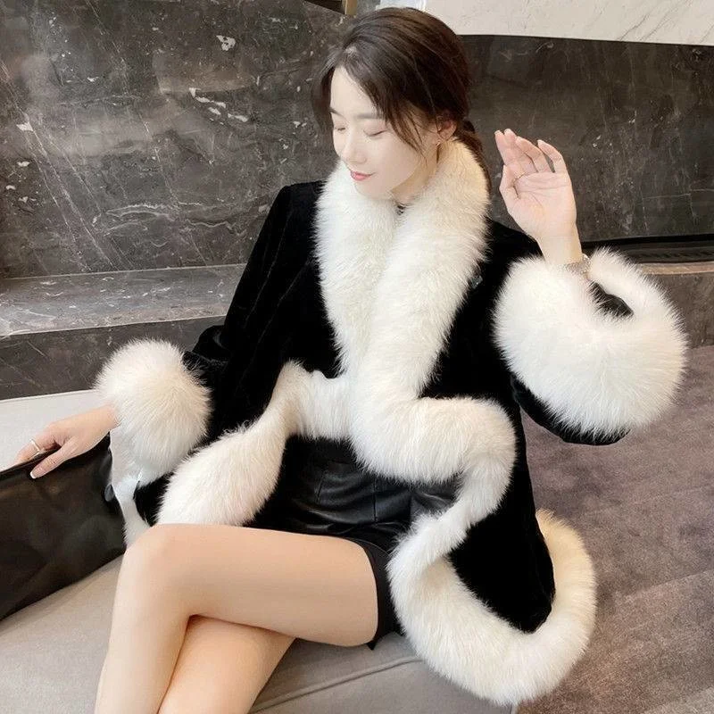 2022 autumn and winter new loose imitation fur black and white stitching warm air fashion all-match cape coat women