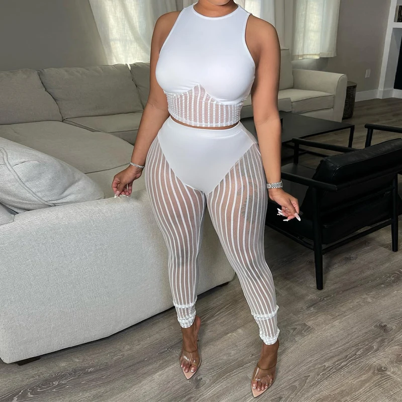 

Женский комплект из двух предметов EACHIN, летний комплект из топа без рукавов и соблазнительных сетчатых брюк, модный пляжный клубный костюм ...