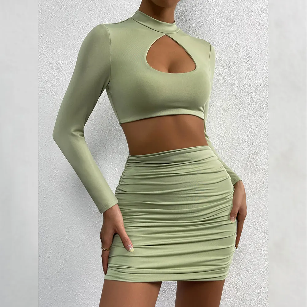 

2022 Sexy Solid Skirts 2 Piece Set Women Sexy Hollow Out Crop Top And Mini Skirts Bodycon Club Party Female Two Piece Set Outfit