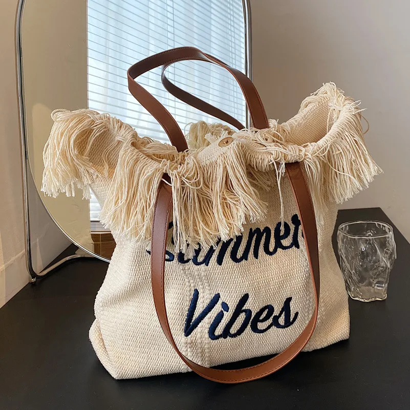 

2022 New Tassel Decorative Shoulder Bag Large Capacity Handbag Summer Casual Tote Bag Letter Pattern Canvas Bag