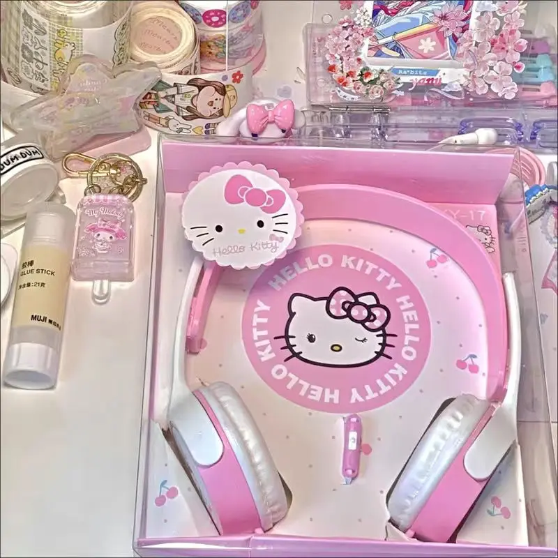 

Sanrios Hellokittys Animation Peripheral Cute Cartoon Headphone Japanese Kawaii Girl Heart Pink Round Hole Wired Headset Gift