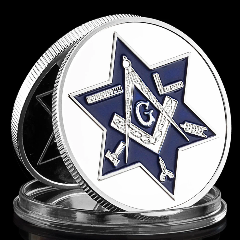 

Посеребренная масонская памятная монета