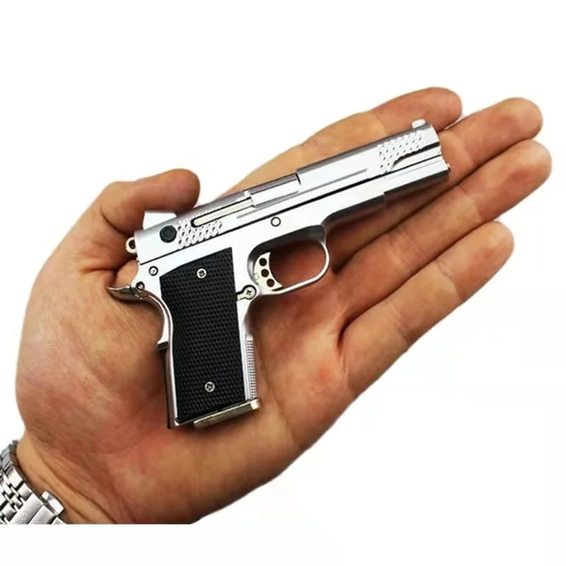 

1:2.05 Miniature Gun Model Alloy Colt 945 Pistol Miniature Model Keychain Full Metal Shell Alloy Can Not Shoot Boy Birthday Gift