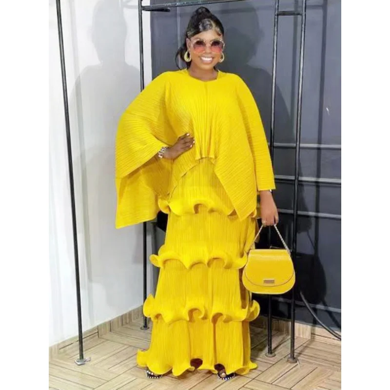 Женский костюм с плиссированной юбкой миаке