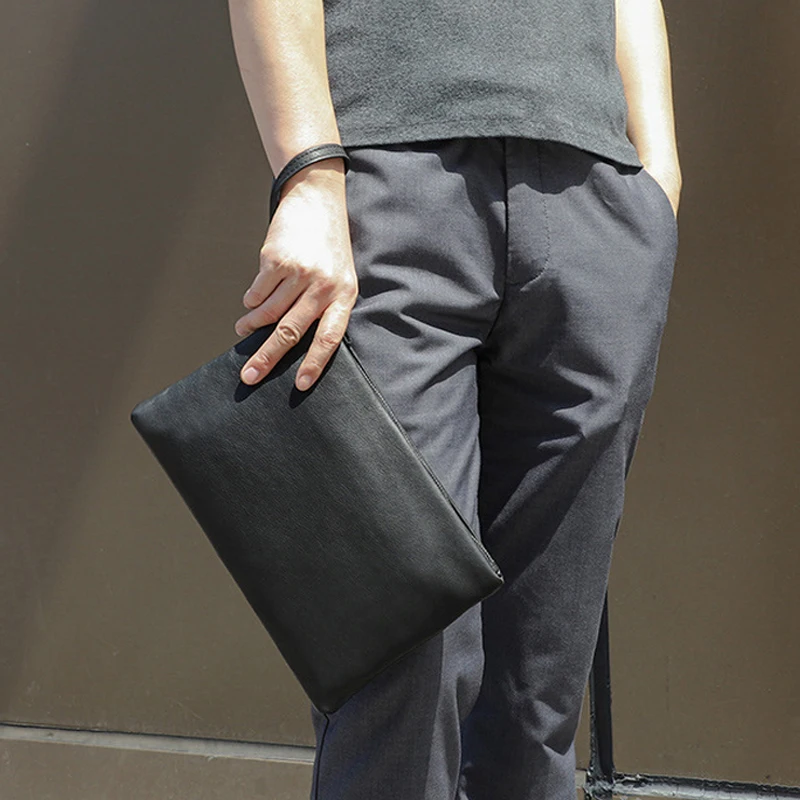 

Мужская сумка-клатч из натуральной кожи, с надписью