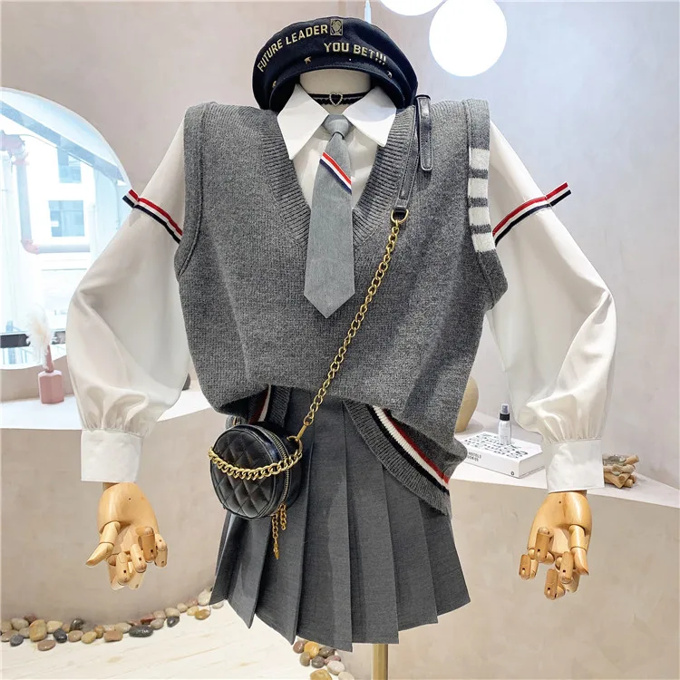 

College Style Three-piece Suit Women 2022 New Spring V-neck Knitted Vest + White Tie Shirts + Short Pleated Skirt Students Set