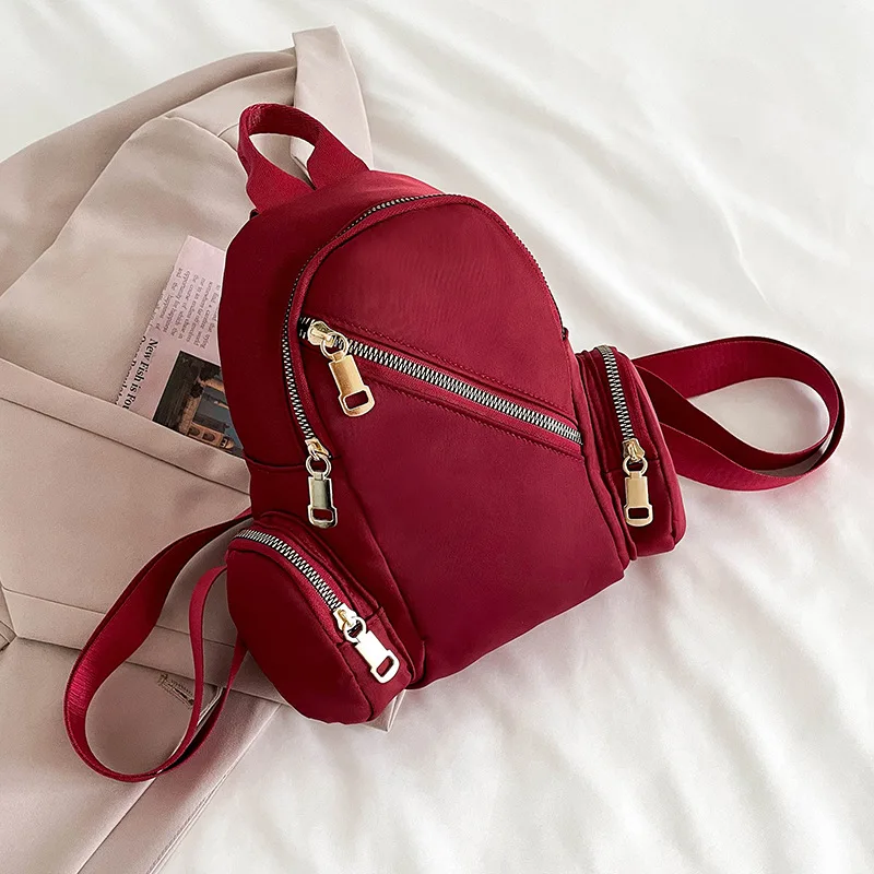

New Simple Solid Color Backpack Female 2022 Retro Multi-pocket Student Schoolbag Fashion Nylon Backpack Small