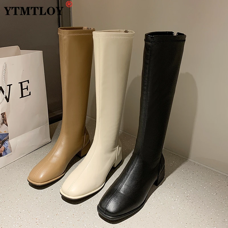 

Модные женские черные и белые высокие сапоги до колена на блочном высоком каблуке, новинка зимы, теплые сапоги до бедра из мягкой кожи, зимни...