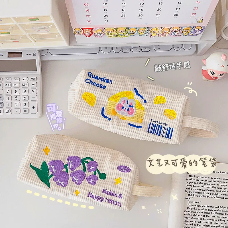 

Cute embroidered pencil bag student large capacity portable stationery bag cartoon stationery storage bag pencil stationery box