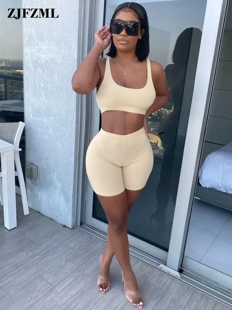 

Спортивные короткие комплекты из двух предметов для женщин, повседневные топы без рукавов с глубоким вырезом и облегающие шорты с эластичн...