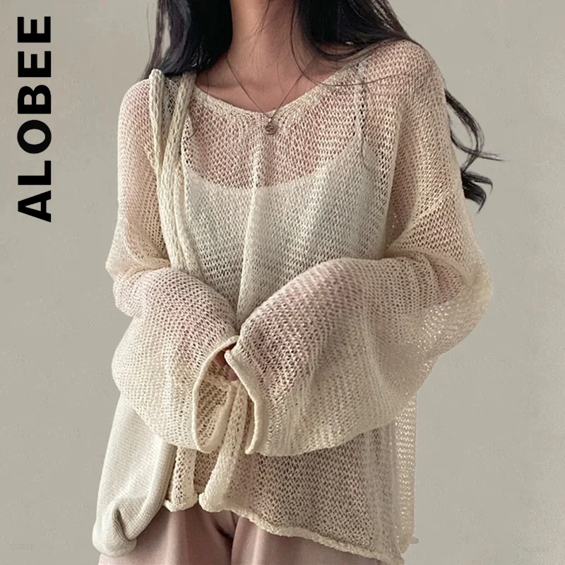 

Женский трикотажный свитер-водолазка с высоким воротником