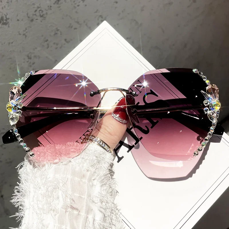 

2023 Luxury Brand Design Fashion Rimless Rhinestone Sunglasses Women Gradient Lens Sun Glasses Shades