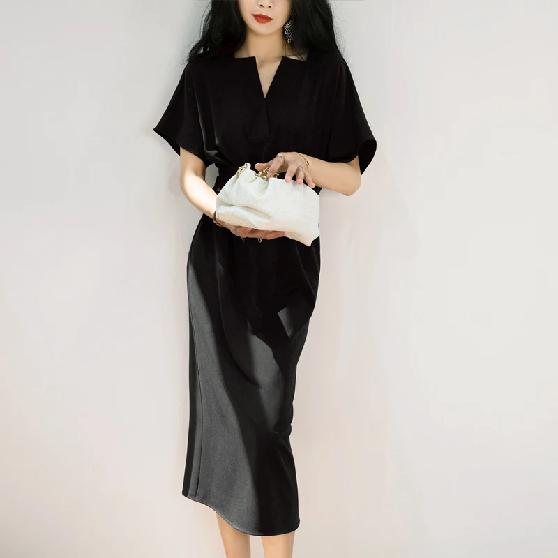 Женское длинное платье с разрезом черное облегающее в стиле ретро