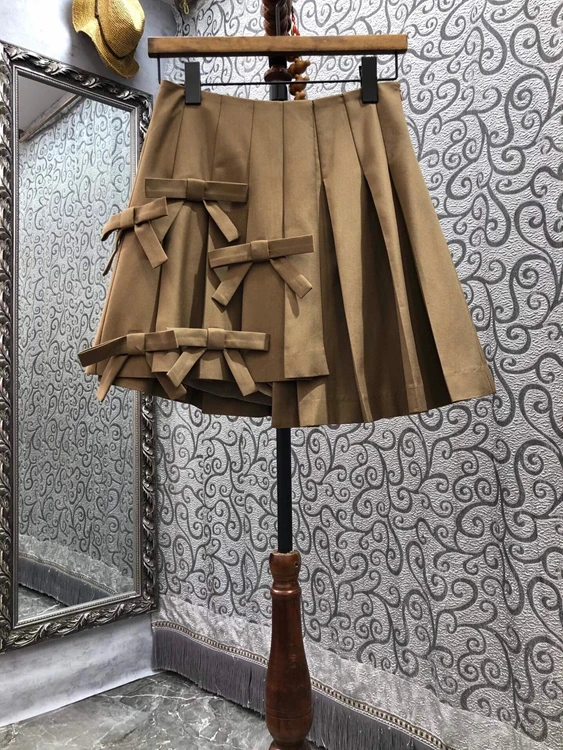 

Женская плиссированная юбка-кюлот с бантом сбоку