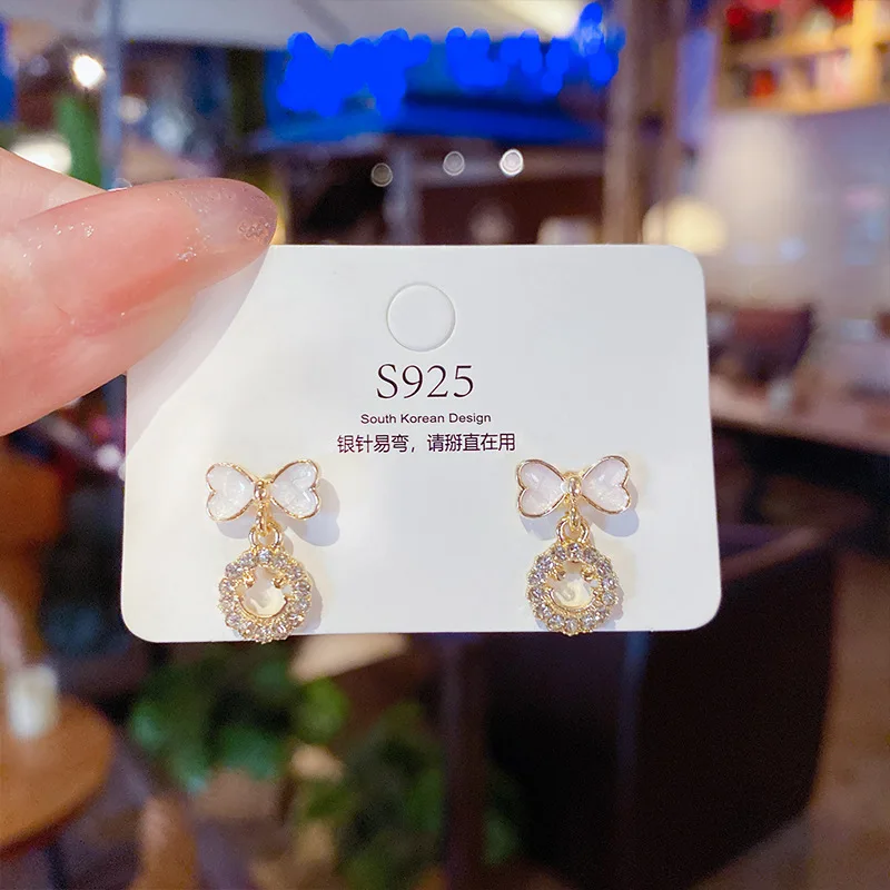 

S925 silver needle temperament Earrings net red retro personalized Earrings simple diamond inlaid fashion Bow Earrings personali