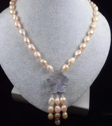 

Hand-woven pink black green white biwa freshwater pearl necklace shell pendant