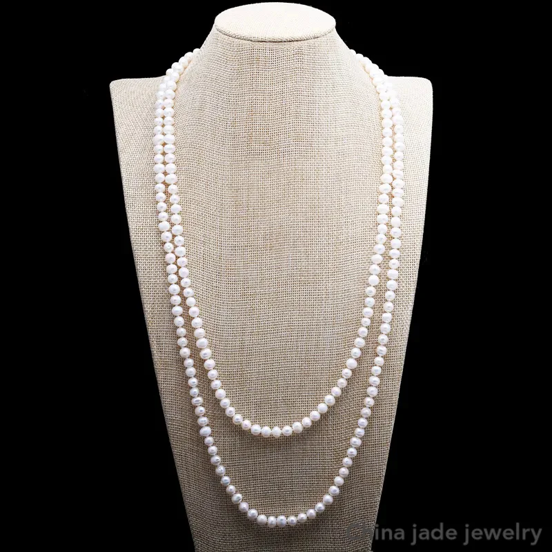 

Цепочка-ожерелье с почти круглым пресноводным жемчугом, длина 7-8 мм, цвет белый/серый, длина 150 см