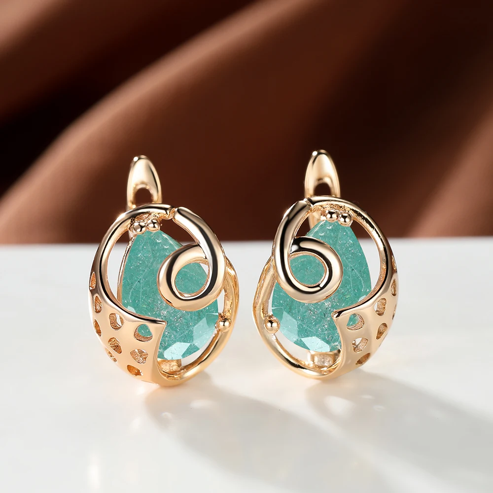 

Bohemia Vintage Teardrop Hoop Earrings for Women Gold Color Hollow Oval Design Crystal Paraiba Stone Earrings Banquet Jewelry