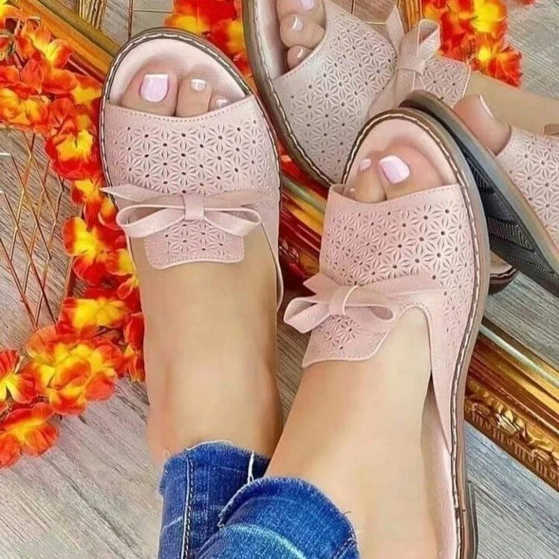 

Slippers women's summer wear 2021 new bows, one-word drag tendons, flat-bottomed soft pregnant women's beach sandals slippers