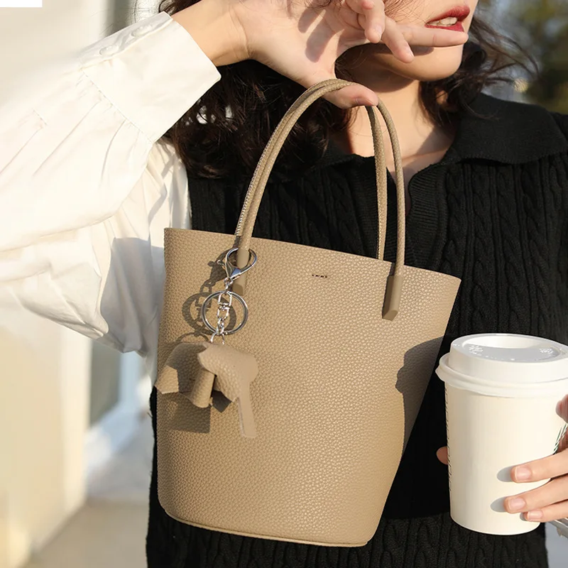 

Luxury Togo Leather Bucket Bag Small Design Light Luxury Ladies Shoulder Bag Leather Handbag with Elephant Ornament