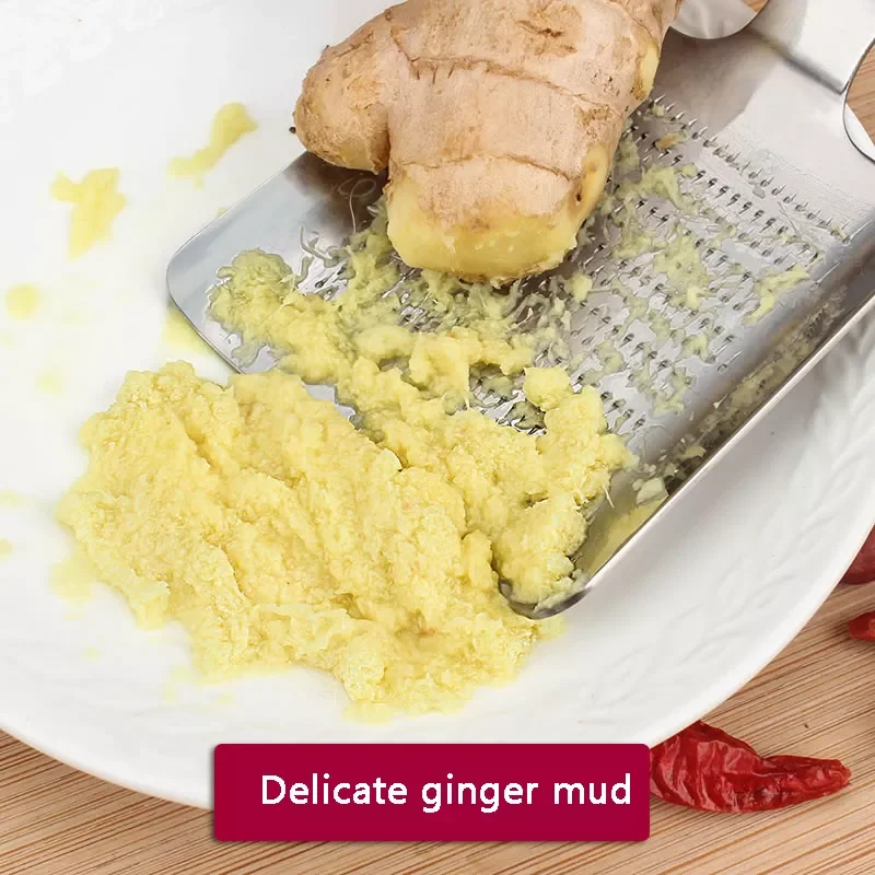 

New in Ginger Garlic Wasabi Grater Crusher Garlic Press Device Chopper Cutter Garlics Peeler Kitchen Tools Stainless Steel envio