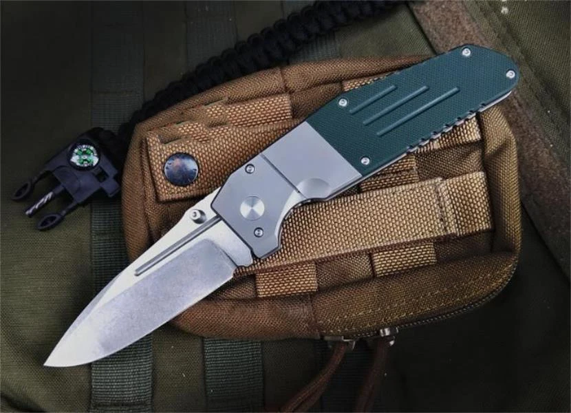 

Складной нож из титанового сплава с рукояткой из G10 и лезвием 7505